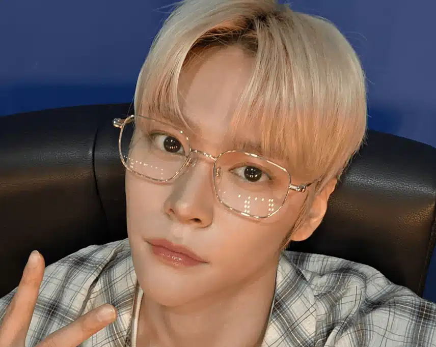 Eunseok, who looks great with blond hair and gold-rimmed glasses