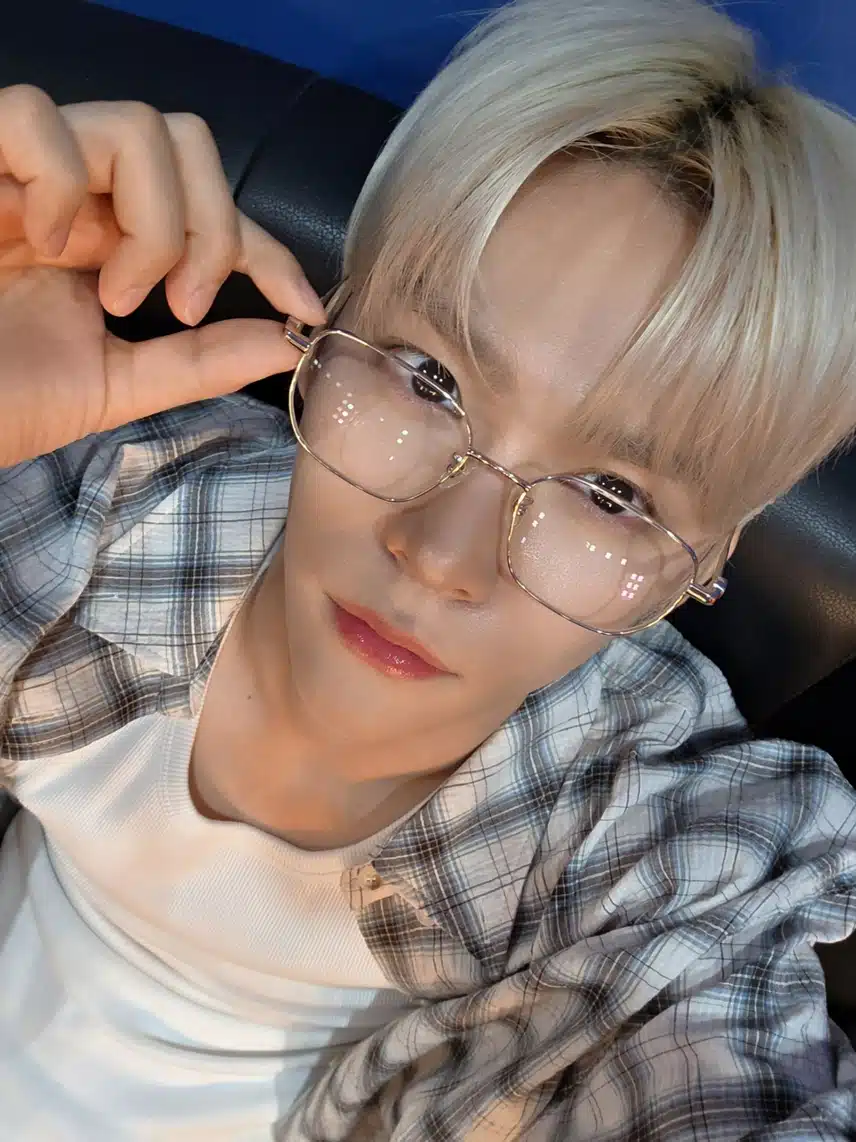 Eunseok, who looks great with blond hair and gold-rimmed glasses