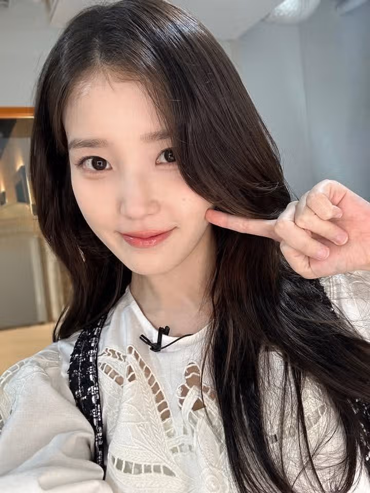 IU's selfies are so cute and nice.